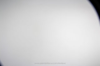 Cokin Z-Pro holder on Canon EF-S 10-22mm f/3.5-4.5 USM @ 10mm focused at infinity. The left side of frame shows 2-slot configuration, right side shows 3-slot configuration. Holder rotated approximately 30 degrees counter clockwise.