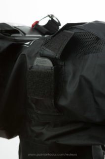 The eye-cup pocketed opened. the contained is a canon pro full frame sized one.