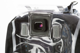 The hydrophobia uses a custom fitted eyecup that seals to thte tight rubber gasket. when not using the clear plastic cover velcros shut over eye-cup. you are shooting in open position.